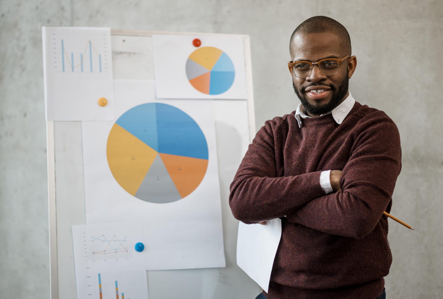 front-view-smiley-man-doing-presentation-meeting-1536x1035